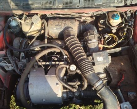 Червоний Пежо 309, об'ємом двигуна 2 л та пробігом 60 тис. км за 650 $, фото 4 на Automoto.ua