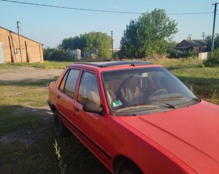 Червоний Пежо 309, об'ємом двигуна 2 л та пробігом 60 тис. км за 650 $, фото 1 на Automoto.ua