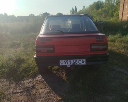 Червоний Пежо 309, об'ємом двигуна 2 л та пробігом 60 тис. км за 650 $, фото 6 на Automoto.ua