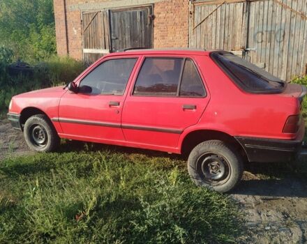 Червоний Пежо 309, об'ємом двигуна 2 л та пробігом 60 тис. км за 650 $, фото 3 на Automoto.ua