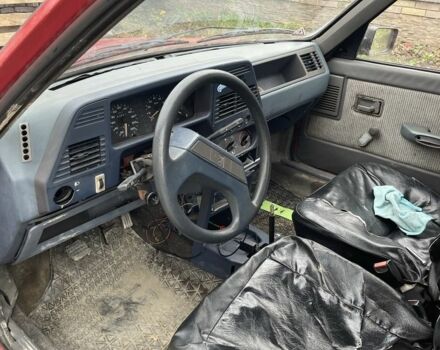 Красный Пежо 309, объемом двигателя 1.4 л и пробегом 250 тыс. км за 600 $, фото 4 на Automoto.ua