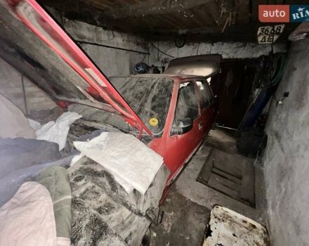 Червоний Пежо 309, об'ємом двигуна 1.3 л та пробігом 100 тис. км за 287 $, фото 1 на Automoto.ua