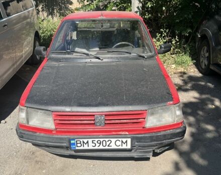 Красный Пежо 309, объемом двигателя 1.6 л и пробегом 285 тыс. км за 532 $, фото 1 на Automoto.ua