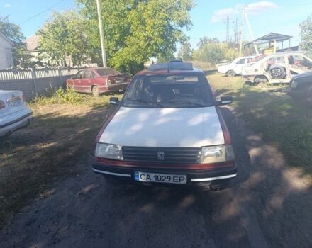 Красный Пежо 309, объемом двигателя 1.4 л и пробегом 111 тыс. км за 650 $, фото 1 на Automoto.ua