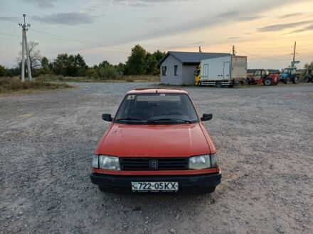 Червоний Пежо 309, об'ємом двигуна 1.4 л та пробігом 228 тис. км за 898 $, фото 1 на Automoto.ua