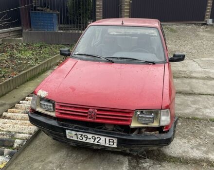 Красный Пежо 309, объемом двигателя 1.4 л и пробегом 250 тыс. км за 600 $, фото 1 на Automoto.ua