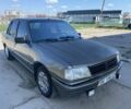 Сірий Пежо 309, об'ємом двигуна 1.4 л та пробігом 300 тис. км за 950 $, фото 1 на Automoto.ua