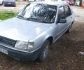 Серый Пежо 309, объемом двигателя 1.4 л и пробегом 222 тыс. км за 1300 $, фото 2 на Automoto.ua