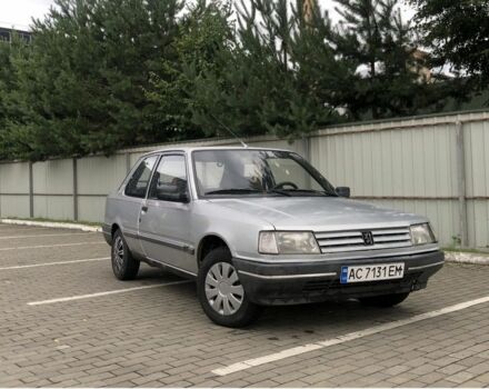 Сірий Пежо 309, об'ємом двигуна 1.1 л та пробігом 33 тис. км за 850 $, фото 2 на Automoto.ua