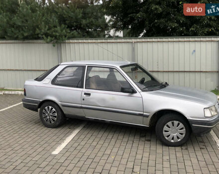 Серый Пежо 309, объемом двигателя 1.1 л и пробегом 388 тыс. км за 1200 $, фото 2 на Automoto.ua