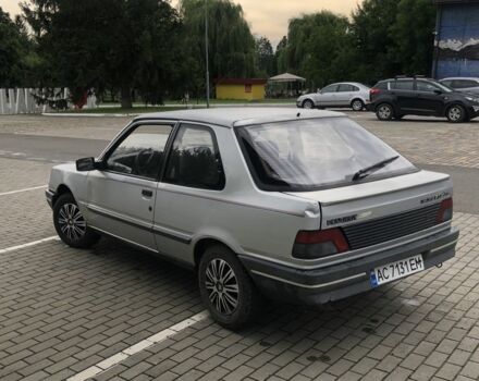 Серый Пежо 309, объемом двигателя 1.1 л и пробегом 380 тыс. км за 1200 $, фото 3 на Automoto.ua