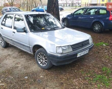 Сірий Пежо 309, об'ємом двигуна 1.4 л та пробігом 222 тис. км за 1300 $, фото 1 на Automoto.ua