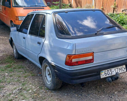 Серый Пежо 309, объемом двигателя 1.9 л и пробегом 150 тыс. км за 1200 $, фото 1 на Automoto.ua