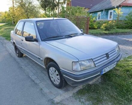 Сірий Пежо 309, об'ємом двигуна 1.1 л та пробігом 388 тис. км за 750 $, фото 1 на Automoto.ua