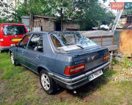 Синий Пежо 309, объемом двигателя 1.58 л и пробегом 193 тыс. км за 1249 $, фото 2 на Automoto.ua