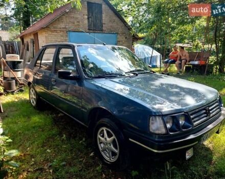Синий Пежо 309, объемом двигателя 1.58 л и пробегом 193 тыс. км за 1249 $, фото 7 на Automoto.ua