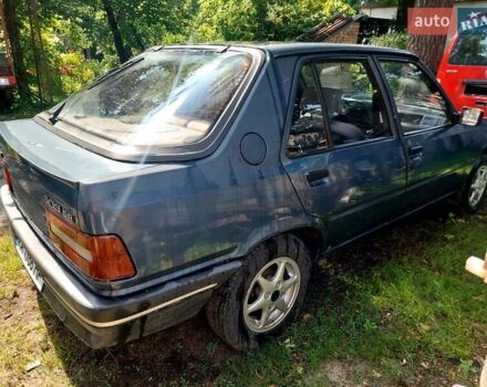 Синий Пежо 309, объемом двигателя 1.58 л и пробегом 193 тыс. км за 1249 $, фото 5 на Automoto.ua