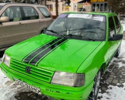 Зеленый Пежо 309, объемом двигателя 1.6 л и пробегом 285 тыс. км за 1600 $, фото 1 на Automoto.ua