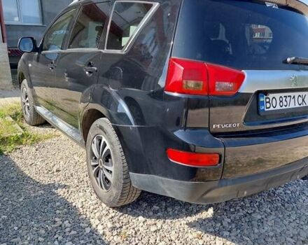 Черный Пежо 4007, объемом двигателя 2.2 л и пробегом 390 тыс. км за 8579 $, фото 1 на Automoto.ua