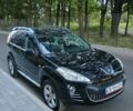 Черный Пежо 4007, объемом двигателя 2.2 л и пробегом 260 тыс. км за 8750 $, фото 1 на Automoto.ua