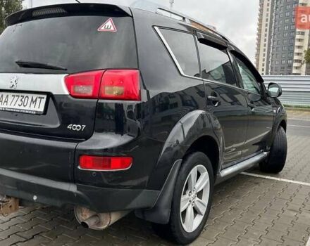 Черный Пежо 4007, объемом двигателя 2.36 л и пробегом 368 тыс. км за 8500 $, фото 4 на Automoto.ua