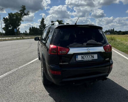 Чорний Пежо 4007, об'ємом двигуна 2.2 л та пробігом 325 тис. км за 11000 $, фото 1 на Automoto.ua