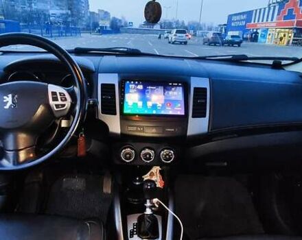 Черный Пежо 4007, объемом двигателя 2.2 л и пробегом 162 тыс. км за 12000 $, фото 7 на Automoto.ua