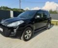Черный Пежо 4007, объемом двигателя 2.2 л и пробегом 223 тыс. км за 9100 $, фото 1 на Automoto.ua