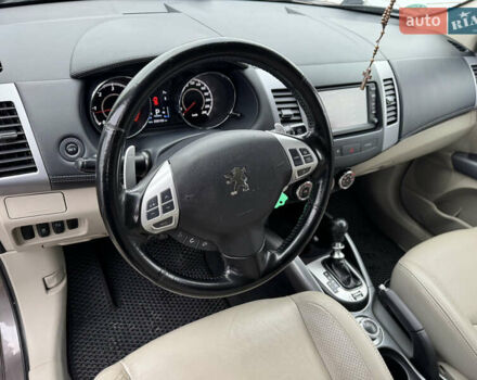 Коричневый Пежо 4007, объемом двигателя 2.18 л и пробегом 258 тыс. км за 10000 $, фото 19 на Automoto.ua