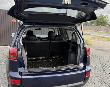 Синий Пежо 4007, объемом двигателя 2.18 л и пробегом 249 тыс. км за 9800 $, фото 3 на Automoto.ua