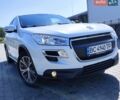Белый Пежо 4008, объемом двигателя 1.6 л и пробегом 244 тыс. км за 12900 $, фото 1 на Automoto.ua