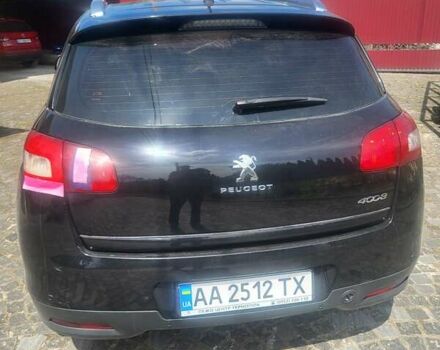 Черный Пежо 4008, объемом двигателя 2 л и пробегом 184 тыс. км за 10800 $, фото 2 на Automoto.ua