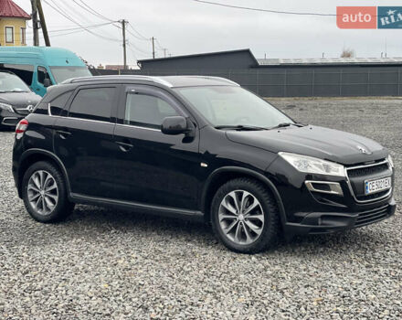 Черный Пежо 4008, объемом двигателя 2 л и пробегом 205 тыс. км за 11950 $, фото 5 на Automoto.ua