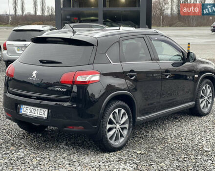 Черный Пежо 4008, объемом двигателя 2 л и пробегом 205 тыс. км за 11950 $, фото 8 на Automoto.ua