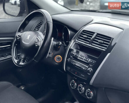 Черный Пежо 4008, объемом двигателя 2 л и пробегом 205 тыс. км за 11950 $, фото 20 на Automoto.ua