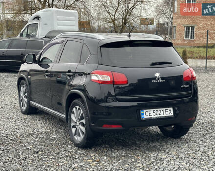 Черный Пежо 4008, объемом двигателя 2 л и пробегом 205 тыс. км за 11950 $, фото 10 на Automoto.ua