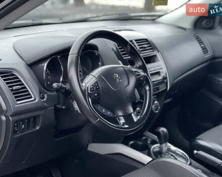 Черный Пежо 4008, объемом двигателя 2 л и пробегом 205 тыс. км за 11950 $, фото 18 на Automoto.ua