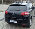 Чорний Пежо 4008, об'ємом двигуна 2 л та пробігом 150 тис. км за 11000 $, фото 4 на Automoto.ua