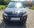 Черный Пежо 4008, объемом двигателя 2 л и пробегом 184 тыс. км за 10800 $, фото 1 на Automoto.ua