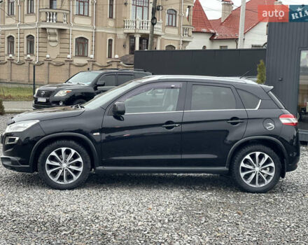 Черный Пежо 4008, объемом двигателя 2 л и пробегом 205 тыс. км за 11950 $, фото 13 на Automoto.ua