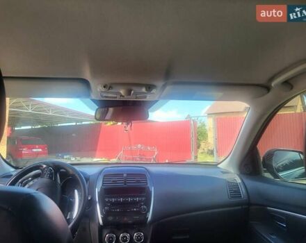 Черный Пежо 4008, объемом двигателя 2 л и пробегом 184 тыс. км за 10800 $, фото 10 на Automoto.ua