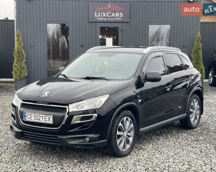 Черный Пежо 4008, объемом двигателя 2 л и пробегом 205 тыс. км за 11950 $, фото 1 на Automoto.ua