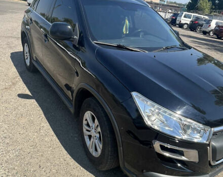 Черный Пежо 4008, объемом двигателя 2 л и пробегом 145 тыс. км за 12200 $, фото 1 на Automoto.ua