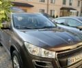 Коричневый Пежо 4008, объемом двигателя 2 л и пробегом 203 тыс. км за 10900 $, фото 1 на Automoto.ua