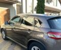 Коричневый Пежо 4008, объемом двигателя 2 л и пробегом 203 тыс. км за 10900 $, фото 2 на Automoto.ua