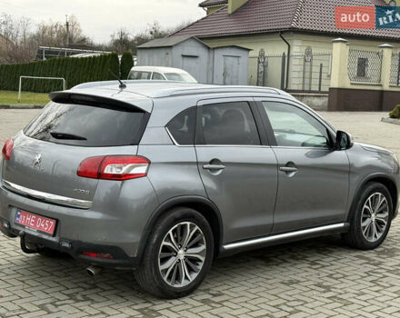 Серый Пежо 4008, объемом двигателя 1.8 л и пробегом 155 тыс. км за 12700 $, фото 7 на Automoto.ua