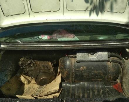 Белый Пежо 405, объемом двигателя 1.4 л и пробегом 190 тыс. км за 650 $, фото 4 на Automoto.ua