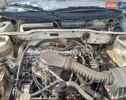 Белый Пежо 405, объемом двигателя 1.6 л и пробегом 112 тыс. км за 350 $, фото 6 на Automoto.ua