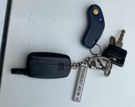 Белый Пежо 405, объемом двигателя 2 л и пробегом 160 тыс. км за 800 $, фото 11 на Automoto.ua