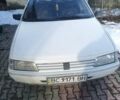 Белый Пежо 405, объемом двигателя 1.9 л и пробегом 240 тыс. км за 900 $, фото 1 на Automoto.ua